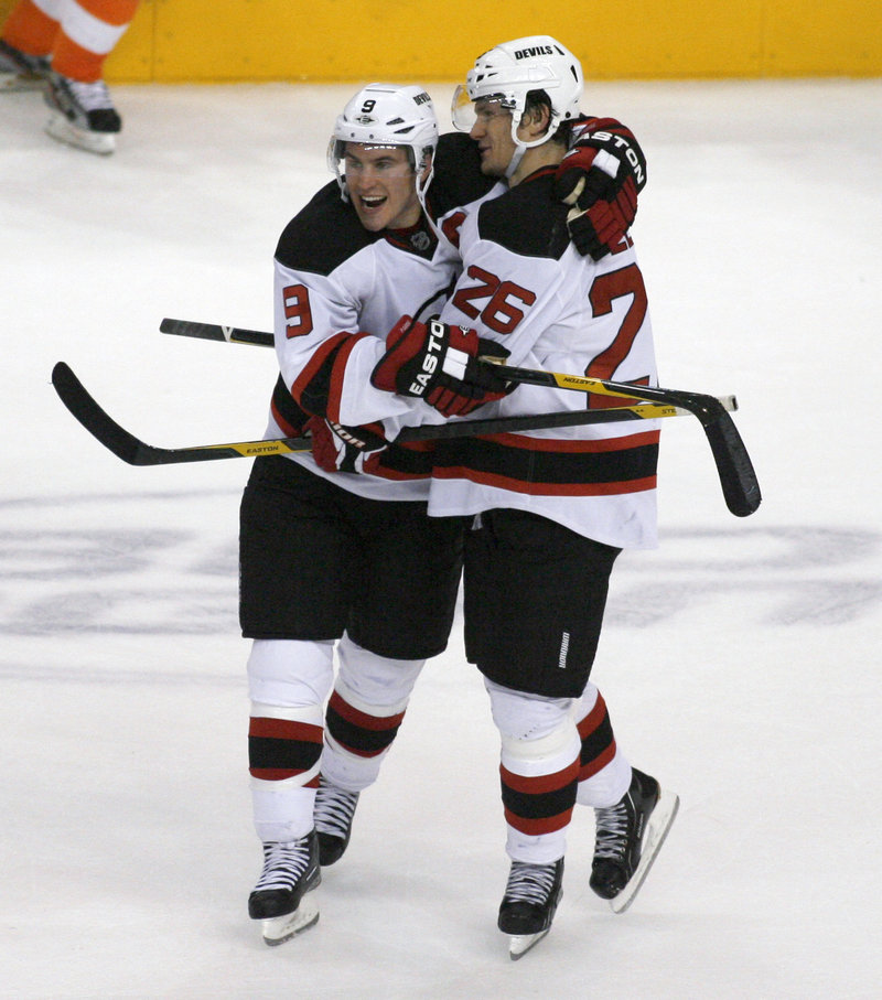 Zach Parise, left, is another American excelling in the NHL. He is one of the top goal scorers for the New Jersey Devils.