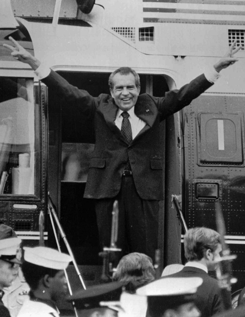 Richard Nixon says goodbye to members of his staff outside the White House in Washington on Aug. 9, 1974.