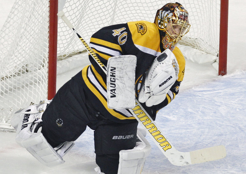 Tuukka Rask makes one of his 27 saves Thursday night in a 6-3 win over Edmonton. Rask has won back-to-back games for the Bruins after losing his first three starts.