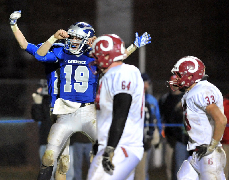 Alex Leathers of Lawrence celebrates Friday night after scoring a second-quarter touchdown in a 40-14 victory against Bangor in the Eastern Class A final.