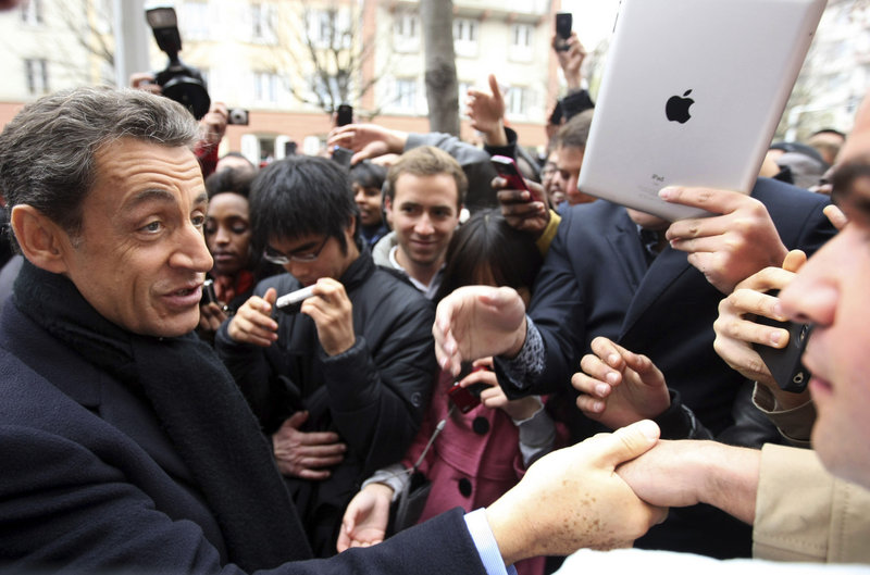 2011 Associated Press file A lower French credit rating could help determine whether President Nicolas Sarkozy, above, is re-elected next year.
