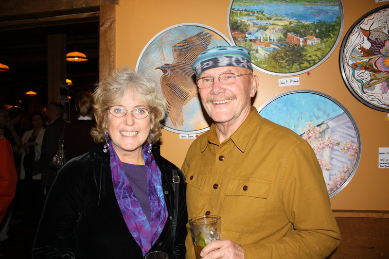 Artist Nora Tryon and Richard Tryon, standing in front of the “Taking Flight” piece Nora Tryon created. The event was held at the Run of the Mill Pub & Brewery in Saco.
