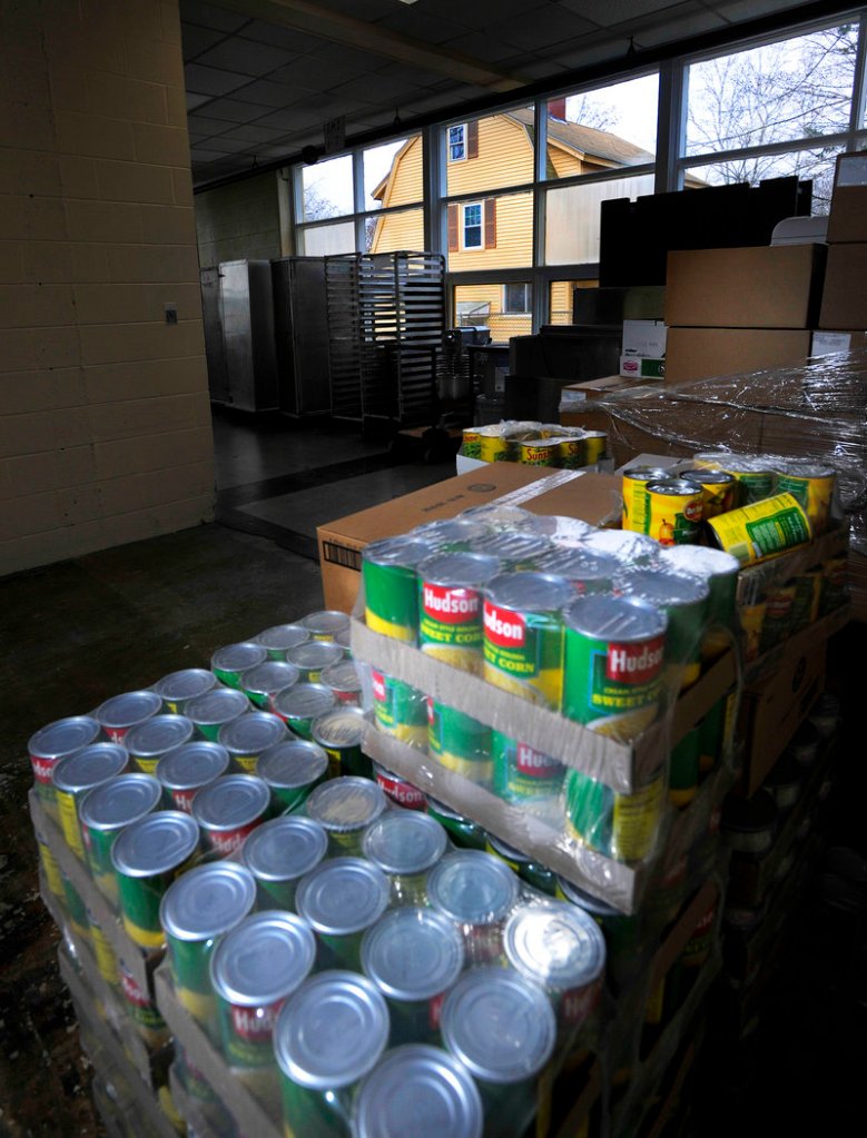 Cans of food are stacked at the Portland School Department's central kitchen. School officials are looking into either renovating the current facility or building a new one near the PATHS school on Allen Avenue.