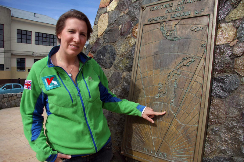British adventurer Felicity Aston shows a map in Punta Arenas, Chile, early this month. Aston, who plans to ski by herself across Antarctica, would set a record for the longest solo polar expedition by a woman, at about 70 days.