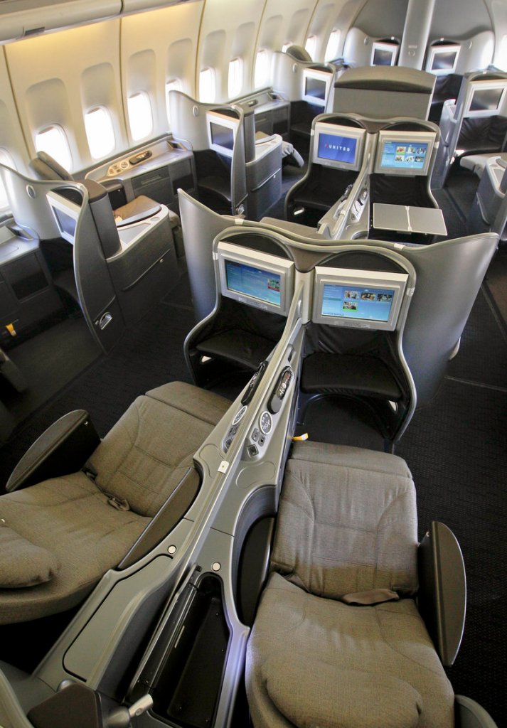 Photo shows the new first-class interior section of a United Airlines 747 plane at San Francisco International Airport. U.S. airlines are spending nearly $2 billion to upgrade long-neglected lounges and aircraft. Their most-prized customers are getting new seats that turn into beds, large flat-screen TVs and savory food and wine.