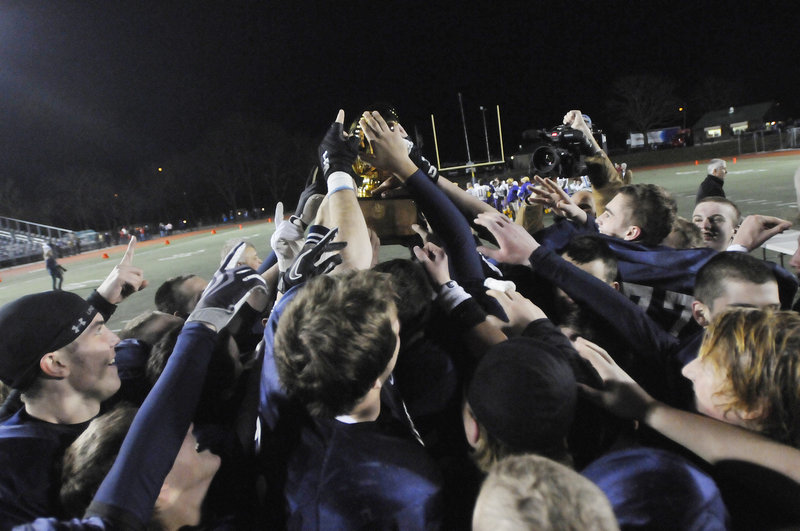 Yarmouth earned its second consecutive Gold Ball and ran its two-year winning streak to 24 games by taking command early and rolling to a 41-14 victory against Bucksport in the Class C state final at Fitzpatrick Stadium.
