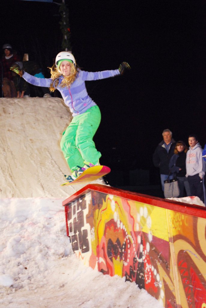 Kaleigh Price hits the rail at Kittery Trading Post on Nov. 18. Rail jam action can often be found in municipal centers and on city streets, but many of Maine's ski areas will host jams with varying levels of competition this winter.