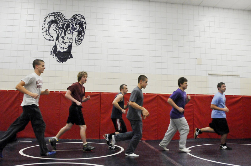 It’s time for conditioning for the Deering wrestling team, which ran 2.5 miles outside on Monday before heading inside for warm-ups, drills and scrimmaging. Deering is hoping to improve on last season’s 2-12 record in dual meets.