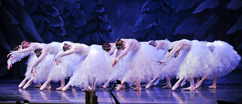 “Waltz of the Snowflakes” ends with a bow by the dancers during a rehearsal of the Maine State Ballet’s production of “The Nutcracker” at Merrill Auditorium in Portland on Tuesday.