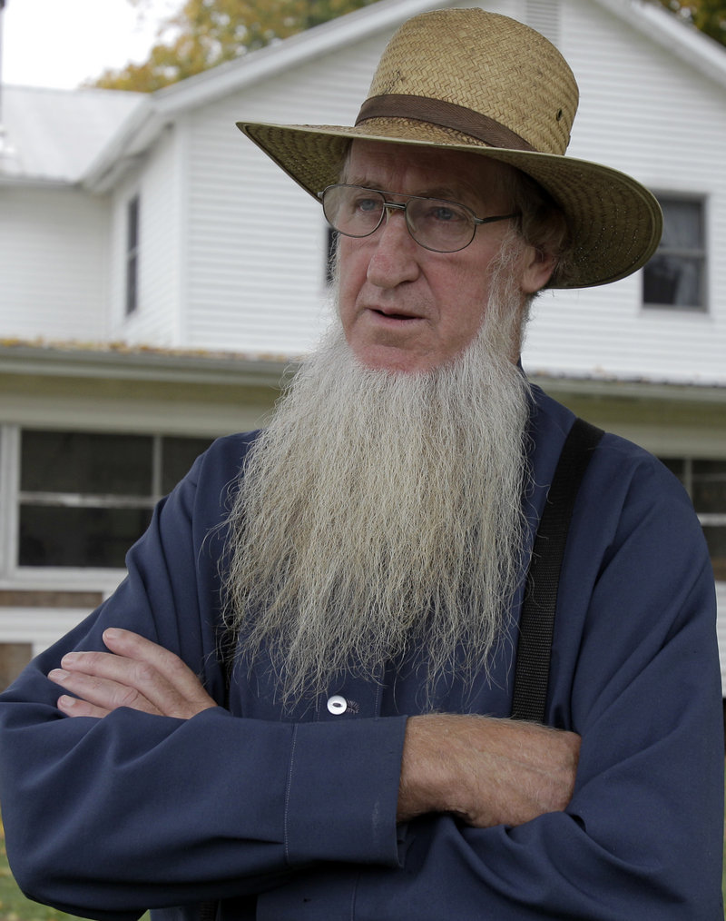 Sam Mullet, the leader of a breakaway Amish group, was charged Wednesday along with six others for hate crimes in hair-cutting attacks against other Amish.