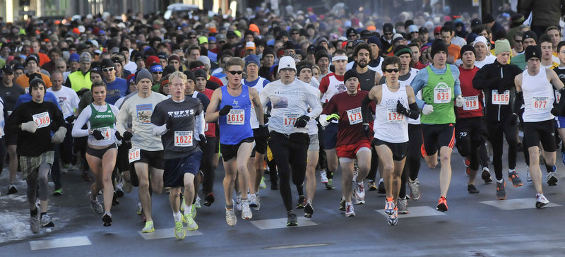 The temperatures were low, but the enthusiasm was high Thursday for the start of the Thanksgiving Day 4-mile road race that wound through downtown Portland.