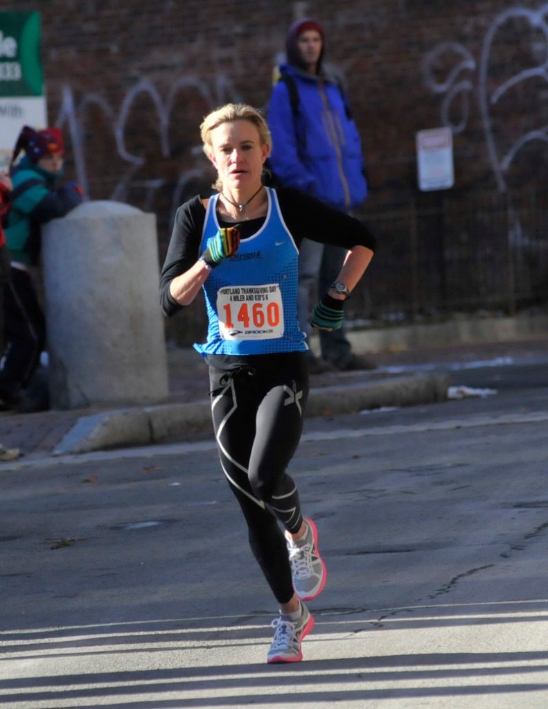 Kristin Barry of Scarborough, training for the Olympic marathon trials, won the women's division in Portland.