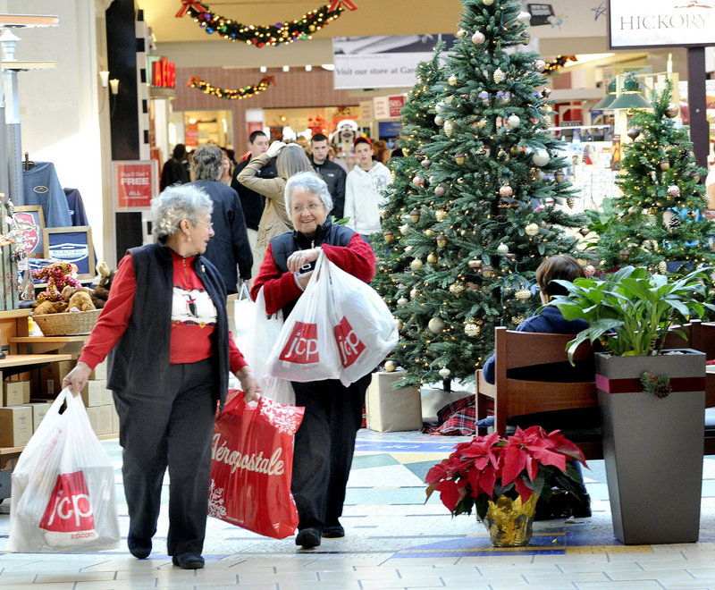 Sisters Connie Donoghue of Sabattus and Jackie Gahagan of Lewiston – who have made shopping together at the Maine Mall a 30-year tradition – join other Black Friday shoppers at the retail mecca, which opened at 5 a.m. Friday. The day after Thanksgiving is typically the biggest shopping day of the year for many of the mall's anchor stores.