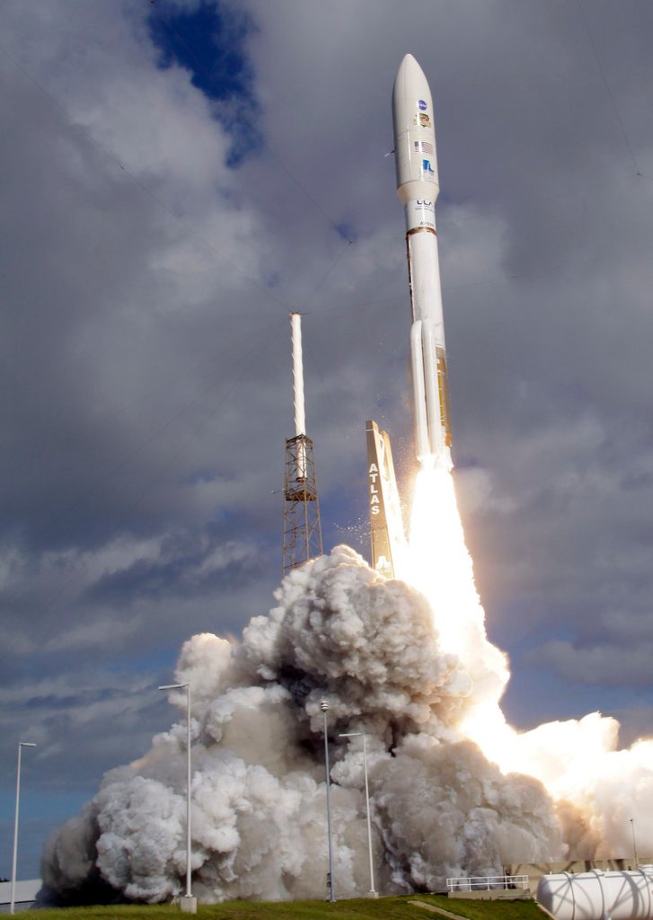 A United Launch Alliance Atlas V rocket carrying Curiosity, NASA's Mars Science Laboratory rover, lifts off at Cape Canaveral Air Force Station in Cape Canaveral, Fla., on Saturday.