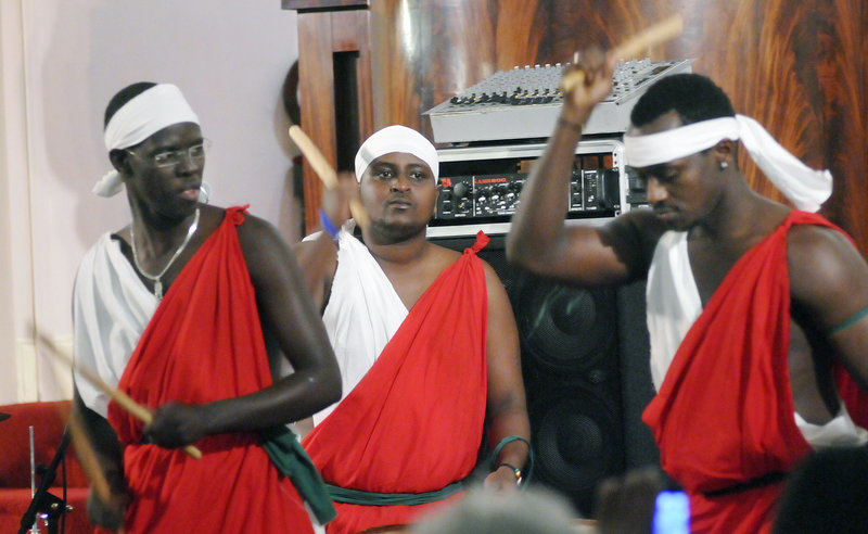 The Akiwacu Band, a group of drummers originally from Burundi in Africa, performs Sunday at First Parish Meeting House during a fundraiser for local immigrants seeking political asylum. The money raised will help pay for the asylum application process.