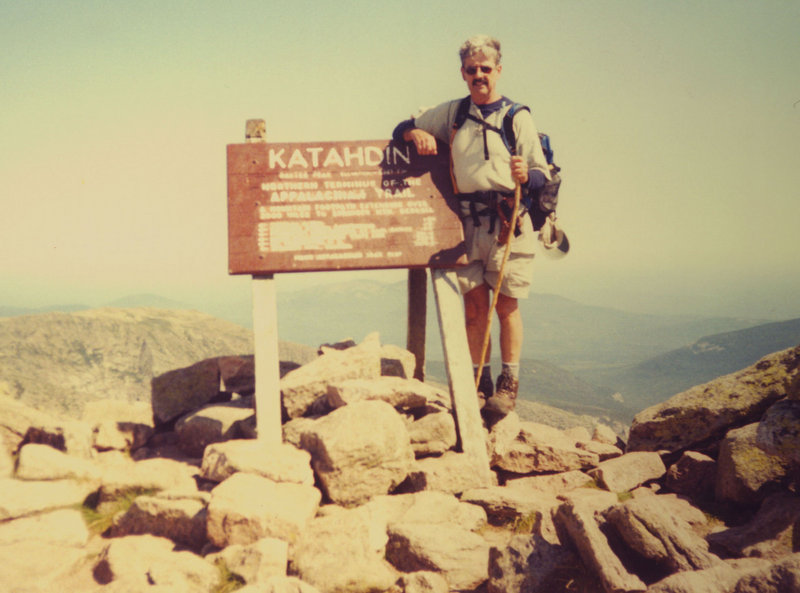 Daigle stands atop Mount Katahdin in this August 2003 photo. His highest total was 45 climbs in one year.