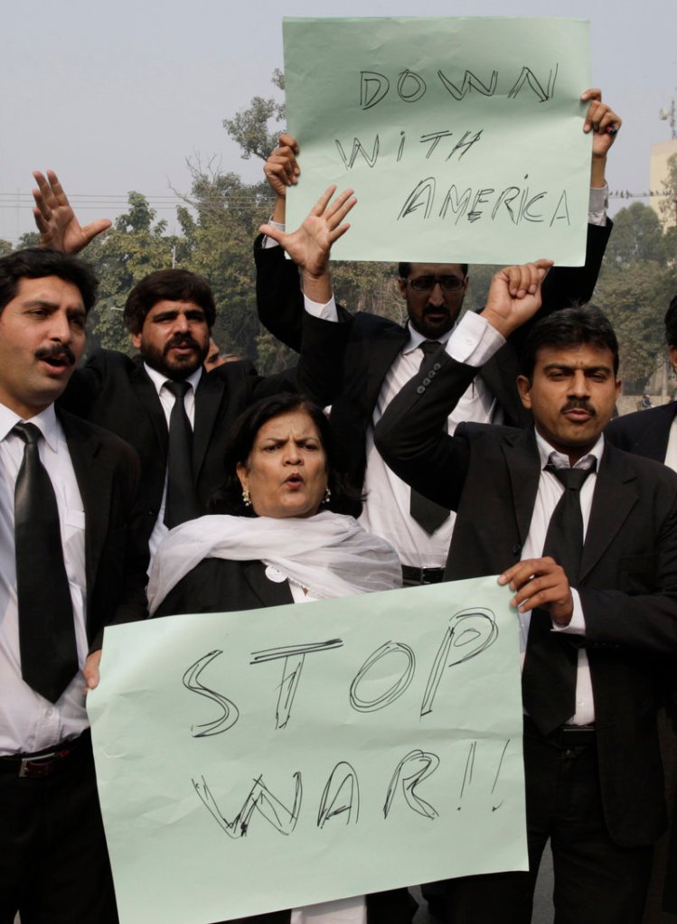 Pakistani lawyers condemn NATO airstrikes on Pakistani border posts, at a protest in in Lahore, Pakistan, on Monday.