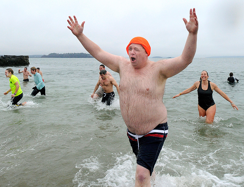 David Greenham from Readfield reacts after his plunge. More than 100 participated in the 4th annual Polar Bear Plunge at the East End Beach in Portland on Saturday, Dec. 31, 2011.