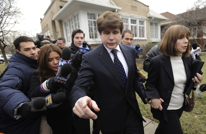 Former Gov. Rod Blagojevich, D-Ill., and his wife, Patti, leave their home for his sentencing hearing in Chicago on Tuesday. ROD BLAGOJEVICH PATTI BLAGOJEVICH