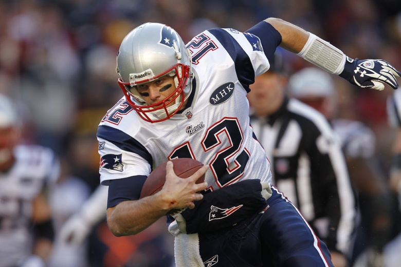 New England Patriots quarterback Tom Brady scrambles down field in last Sunday's game against the Washington Redskins.