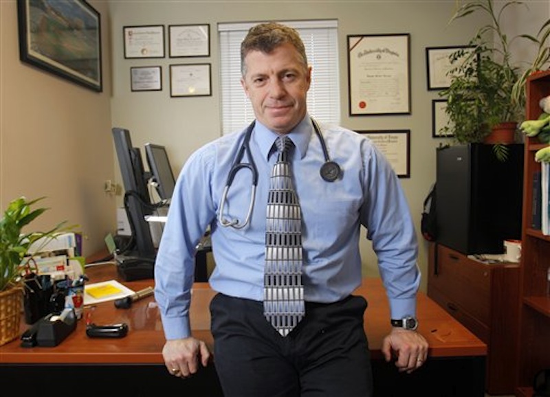 In this Dec. 16, 2011 photo, Dr. Doug Farrago poses in his office in Auburn, Maine. (AP Photo/Robert F. Bukaty)