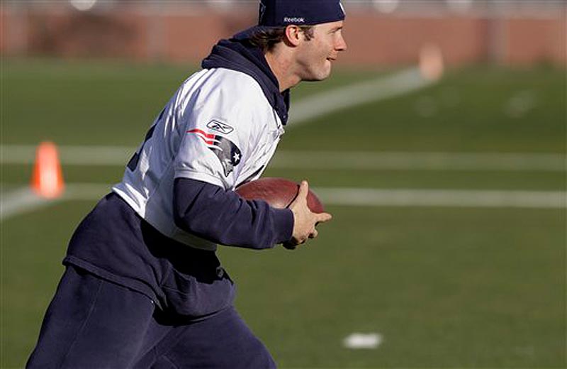 New England Patriots wide receiver Julian Edelman (11) runs a ball back during a kick return drill at practice at the NFL football team's facility in Foxborough, Mass., Wednesday afternoon, Nov. 30, 2011. (AP Photo/Stephan Savoia)