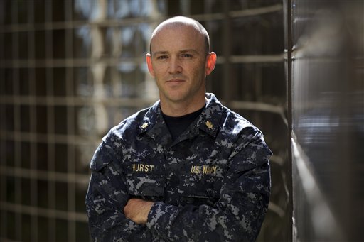 In this Tuesday, Dec. 6, 2011 photo, Lt. Commander Donald Hurst, a fourth-year psychiatry resident at the Naval Hospital in San Diego, poses for a portrait at the hospital, in San Diego. The U.S. Navy has kicked out a record number of sailors and Marines this year for smoking synthetic marijuana and is seeing a dramatic jump in emergency room visits of its users, including some who babbled or hallucinated for eight days. (AP Photo/Gregory Bull)