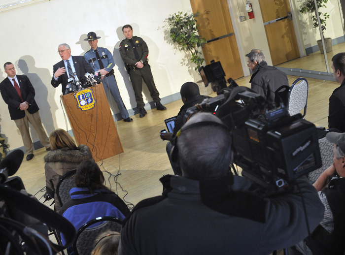 Waterville chief of police Joseph Massey, at podium, speaks to members of the media regarding the disappearance of 20 month-old Ayla Reynolds at a press conference at city hall in Waterville, Maine, Tuesday, Dec. 21, 2011. (AP Photo/Michael C. York)