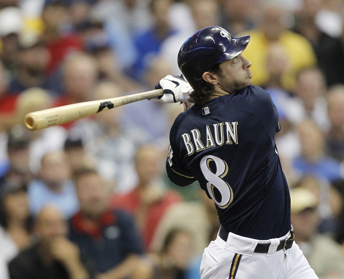 Milwaukee Brewers' Ryan Braun follows through for a home run during a game against the Los Angeles Dodgers in this Aug. 15, 2011, photo.
