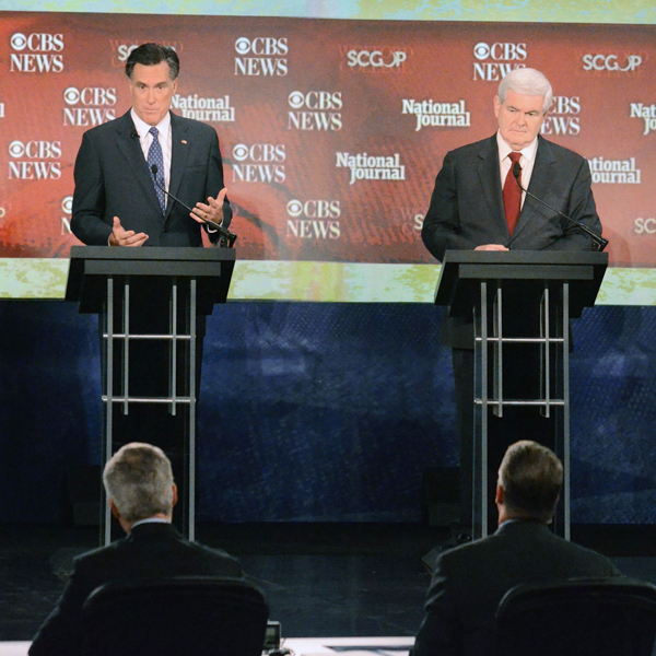 Republican presidential candidates Mitt Romney, left, and Newt Gingrich answer questions on Nov. 12 at the CBS News/National Journal foreign policy debate in Spartanburg, S.C.