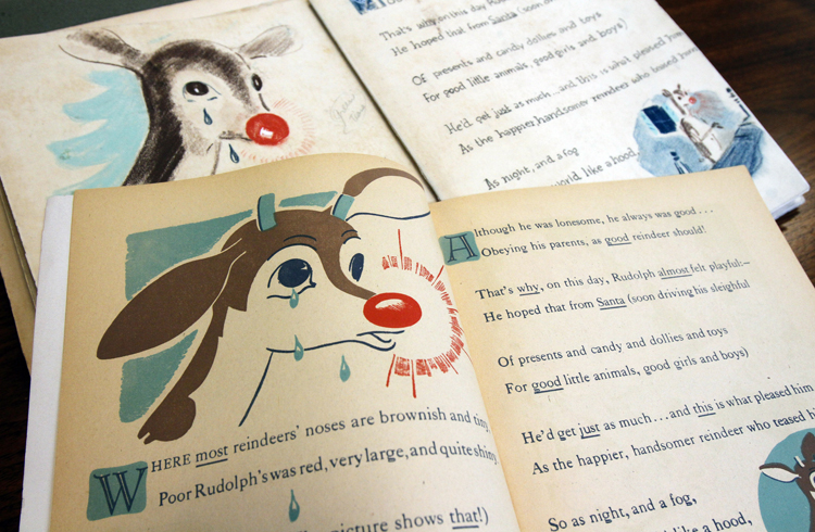 A first edition of "Rudolph, the Red-Nosed Reindeer," bottom, and an original layout, top, is part of a special collection at Dartmouth College.