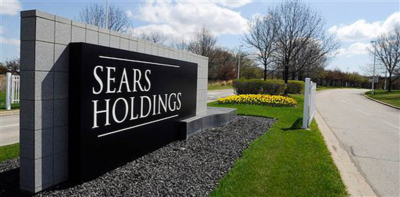 This May 4, 2011 file photo shows the entrance to the Sears Holdings Corp. in Hoffman Estates, Ill. (AP Photo/Daily Herald, Mark Welsh, File)