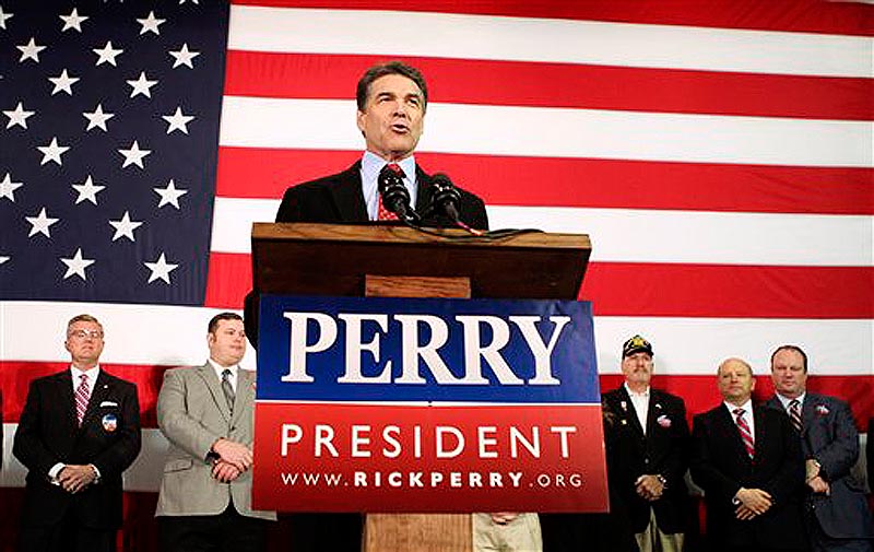 Republican presidential candidate, Texas Gov. Rick Perry speaks to supporters on the U.S.S. Yorktown, Thursday, Dec. 8, 2011, in Charleston, S.C. (AP Photo/Alice Keeney)