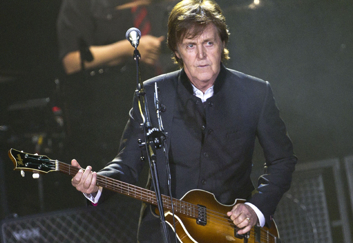 In this Dec. 5, 2011, photo, Sir Paul McCartney performs in London during his European tour, his first since 2004.