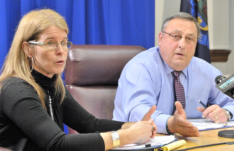 Health and Human Services Commissioner Mary Mayhew and Gov. Paul LePage answer questions during a Thursday news conference at the State House in Augusta.