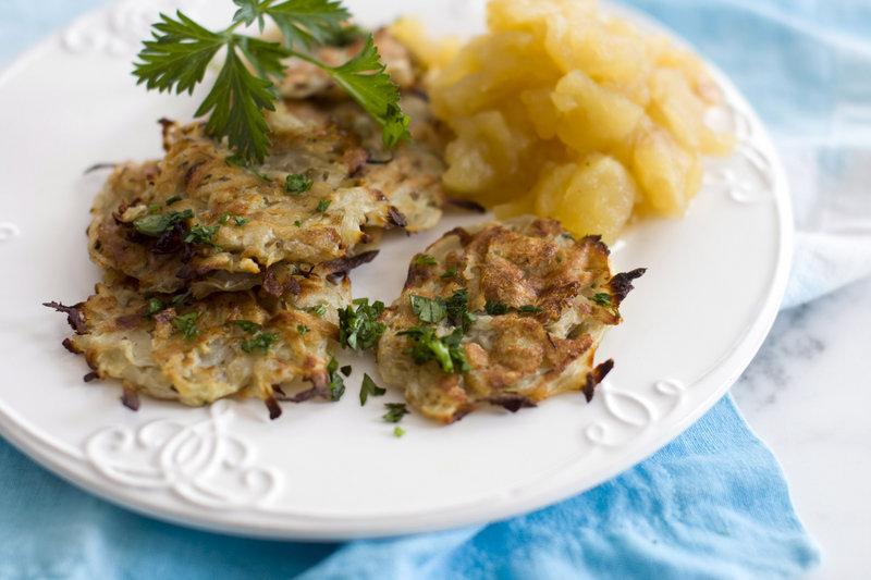 These latkes made with turnip, white potato and sweet potato do not include the traditional accompaniment of sour cream; rather, they’re served with homemade applesauce sweetened with coconut nectar.