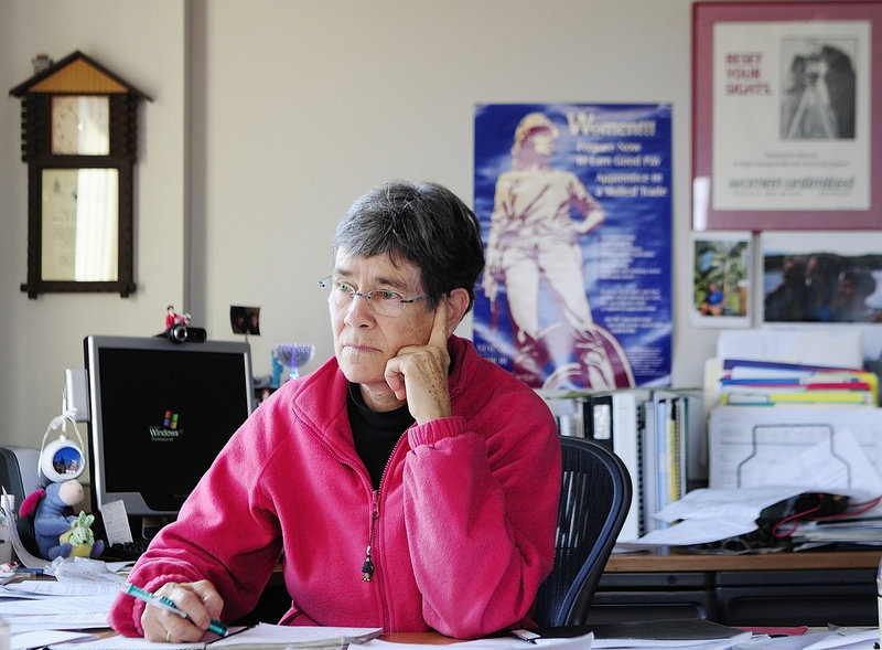 Dale McCormick, MaineHousing executive director, takes a conference call Friday in her Augusta office. McCormick said she feels blindsided by criticism of her oversight of the agency after she had already formed a cost-containment committee.