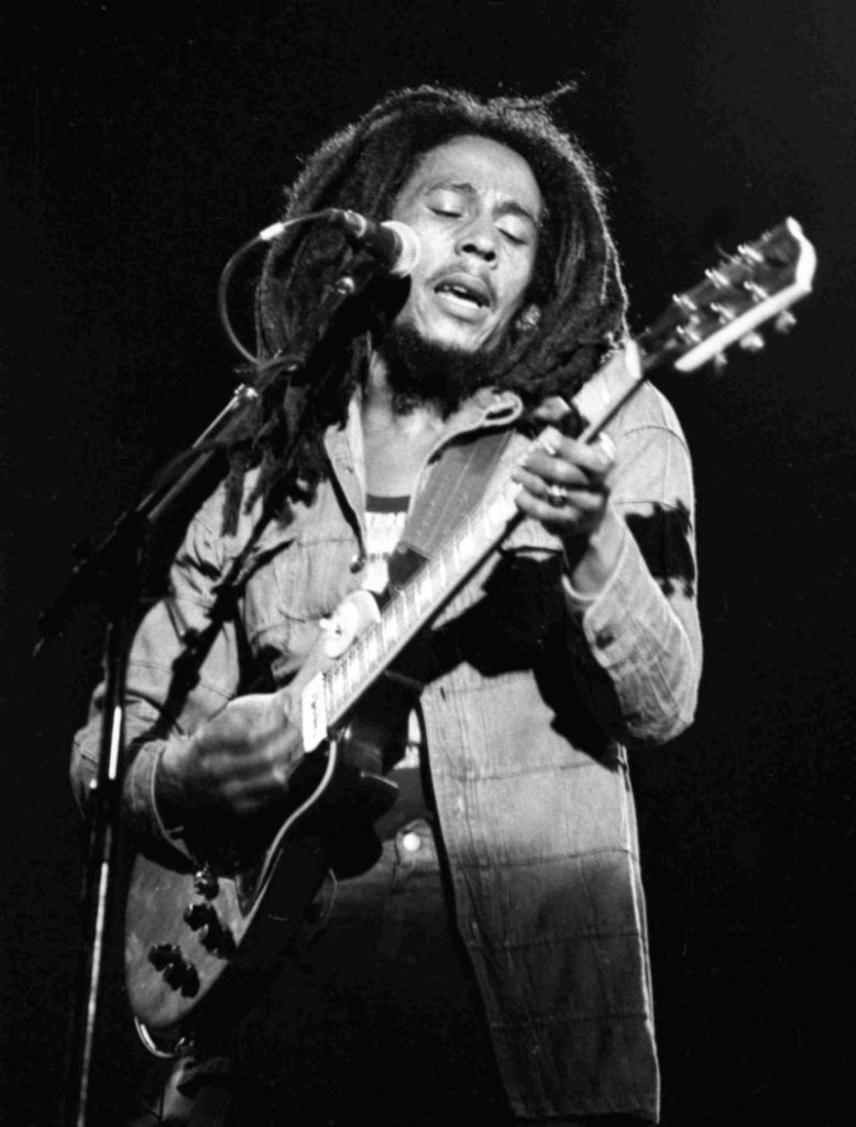 Jamaican reggae singer Bob Marley performs in Paris in 1980. His widow and nine children are suing his half brother to stop use of the Marley name.