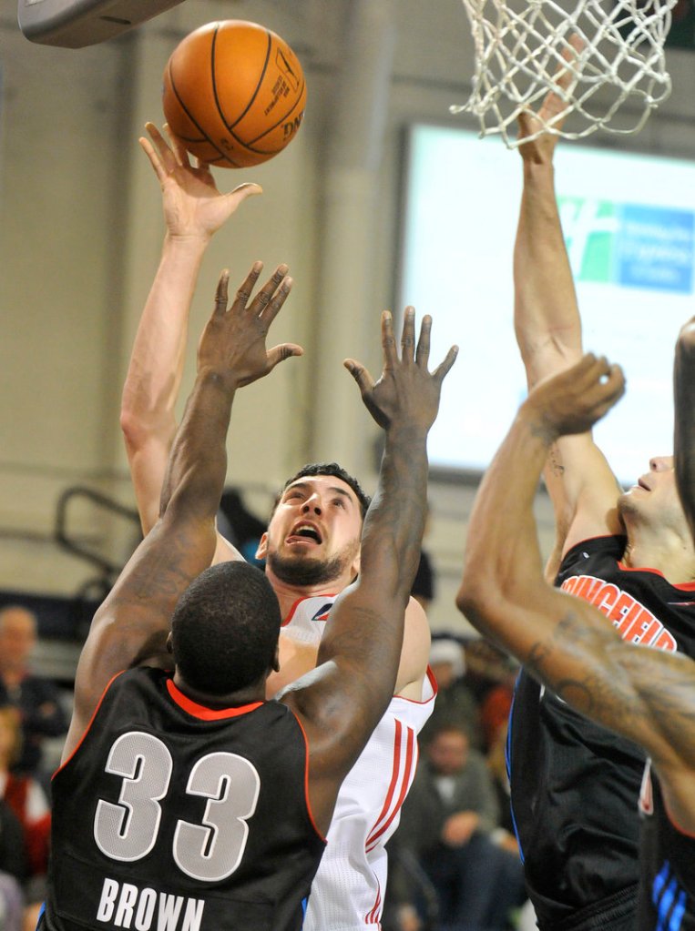 Dominic Calegari joined the Red Claws on Saturday morning, and hours later was putting up a shot in traffic during a 112-107 loss to the Springfield Armor in the home opener.