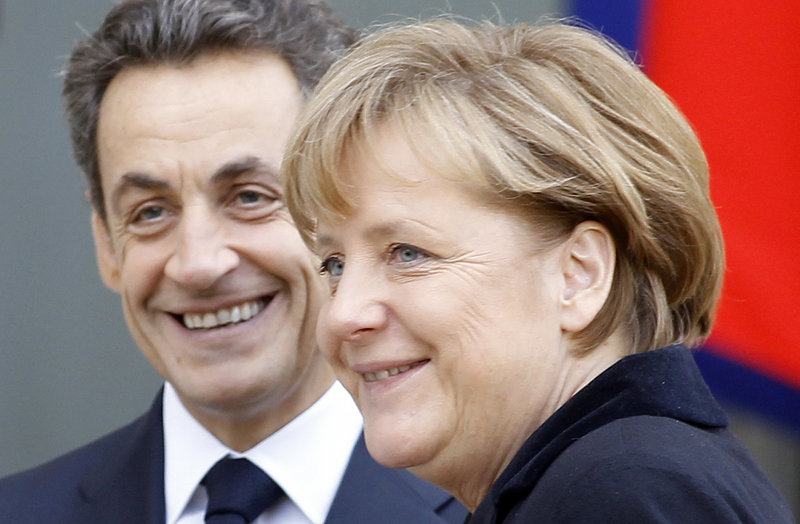 French President Nicolas Sarkozy and German Chancellor Angela Merkel announced an agreement Monday to seek mandatory limits on budget deficits among European nations.