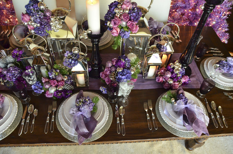 Shades of purple replace traditional reds and greens on this holiday table.