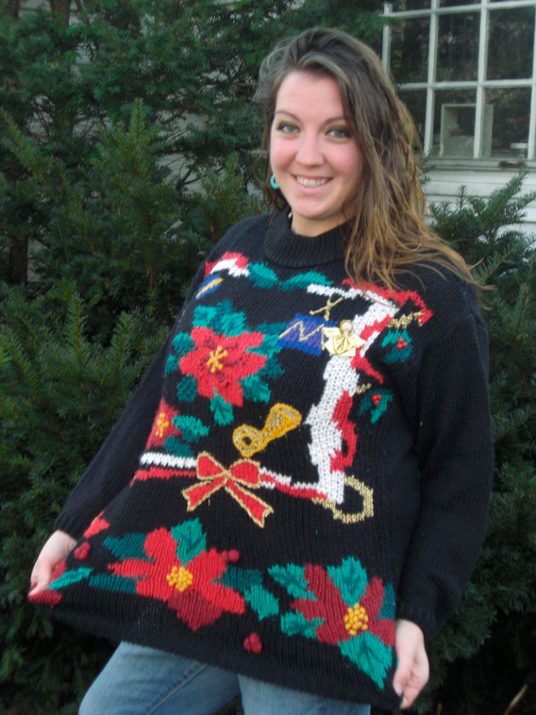 Stacie Biddle is taking part in an effort to set a record for “the most ugly holiday sweaters worn in one place at one time.” Admission to Sunday’s event in Wells will benefit Goodwill.