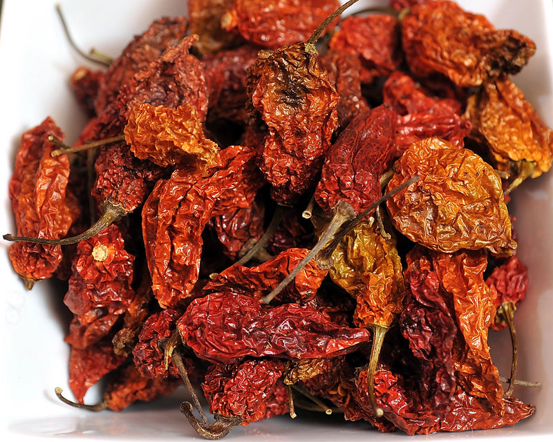 GHOST CHILE – Gryffon Ridge’s ghost chiles come from the Assam province in India, where they were first discovered. This chile is the hottest naturally occurring chile in the world – more than 400 times hotter than Tabasco sauce.