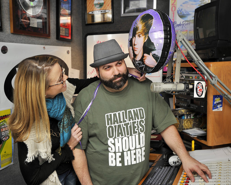 As his 100-hour “Markathon” winds down Friday, WCYY disc jockey Mark Curdo is too tired to fend off the playfulness of Quincy Hentzel, board president of the Center for Grieving Children in Portland. Hentzel had just pledged $30 to hear “Baby” by Justin Bieber, not one of Curdo’s favorite singers. He raised more then $30,000 for the center during this year’s radiothon.