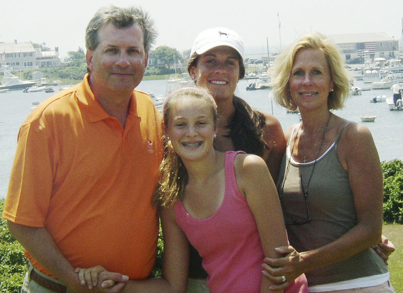 This June 2007 family photo provided by Dr. William Petit Jr. shows Petit, left, with his daughters Michaela, front, Hayley, center rear, and his wife, Jennifer Hawke-Petit.