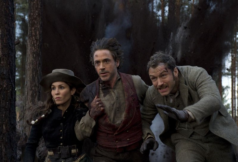 Rapace, Downey and Law on the run in “Sherlock Holmes: A Game of Shadows.”