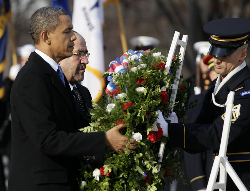 President Obama and Iraq’s Prime Minister Nouri al-Maliki lay a wreath on Monday at the Tomb of the Unknowns at Arlington National Cemetery in Arlington, Va., as part of their observance of the end of U.S. intervention in Iraq.