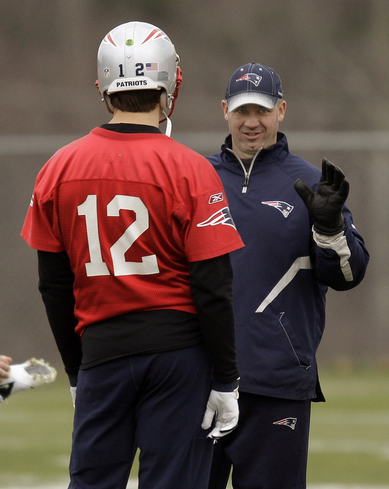 Tom Brady and quarterbacks coach Bill O’Brien talk at practice Wednesday, a few days after their shouting match during last Sunday’s game against Washington. Both downplayed the incident as emotional reactions to a bad play.
