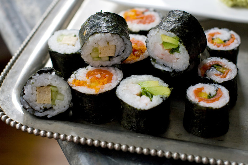 The maki roll, the sushi variety Americans are most familiar with, features sheets of nori seaweed wrapped around cooked sushi rice and a variety of fillings. These are easy to prepare and easy to personalize.