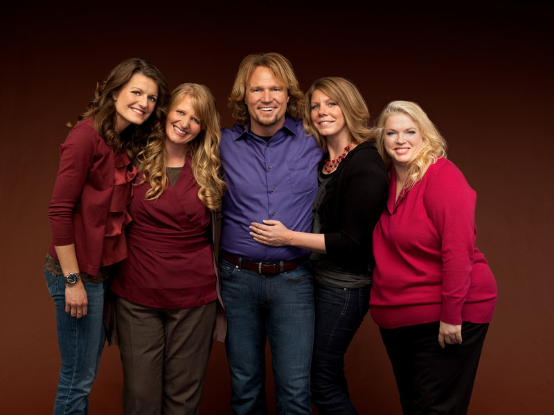 Kody Brown, center, and his wives, from left, Robyn, Christine, Meri and Janelle, are the focus of the TLC reality series, “Sister Wives.” The famous polygamists are challenging Utah’s bigamy law in court.